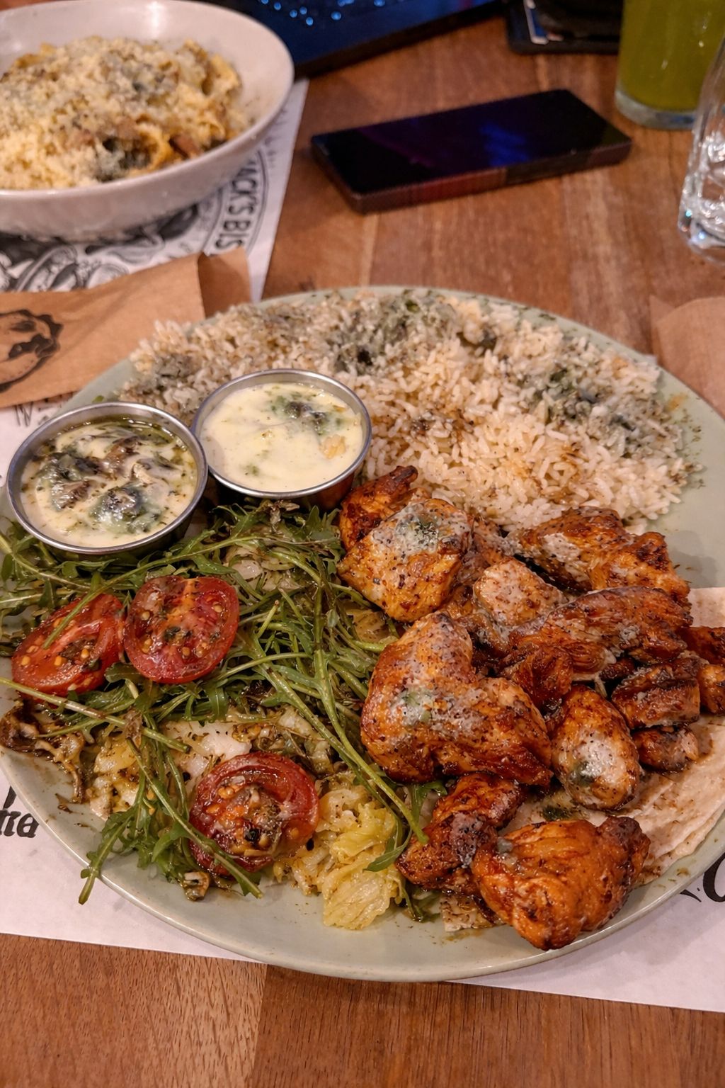 Customer’s complaint photo of a chicken and rice plate